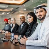 Business team in Dubai Multicultural business people meeting and talking about business - Multiracial business team meeting